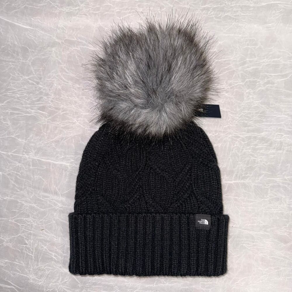 Brand new with tags The North Face Oh Mega Fur Pom Beanie in TNF Black.